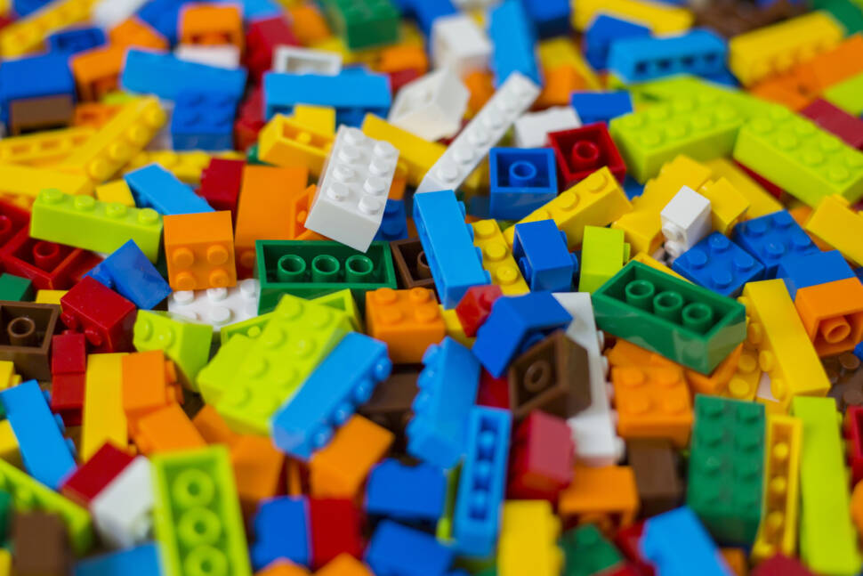 Close-up of a cluttered pile of colorful Lego bricks