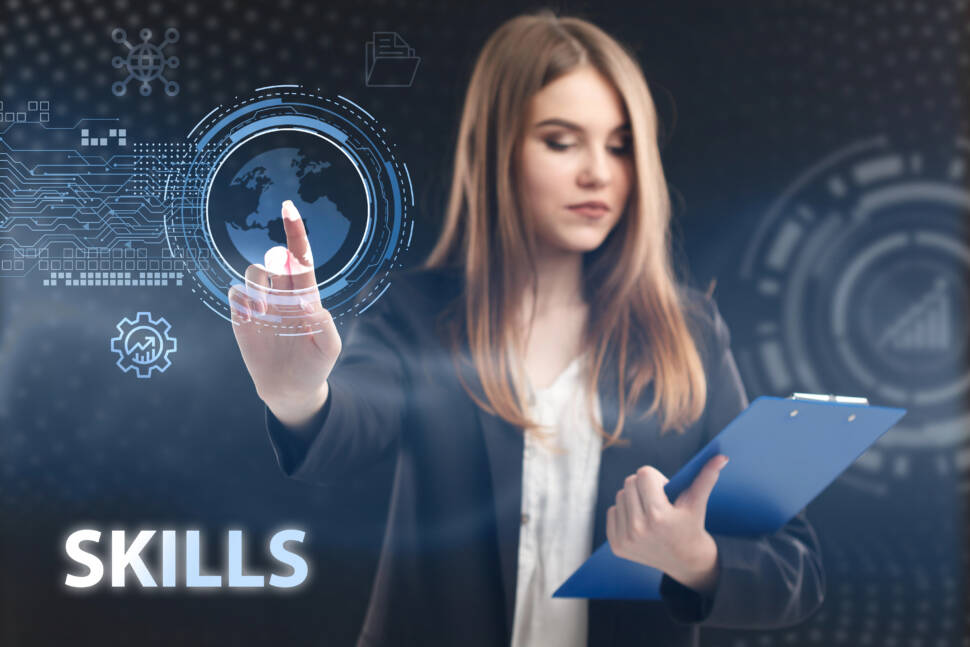 Business, Technology, Internet and network concept. Young businessman working on a virtual screen of the future and sees the inscription: Skills